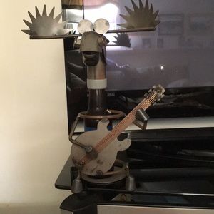 Guitar playing moose bottle decoration for a bar